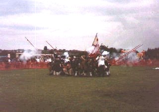 The company at a small scale display at a village fete in Nottingham, demonstrating a hedgehog, or Charge To Horse