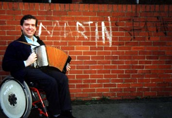 The people at Loughborough Folk Dance Club show their appreciation of Martin's playing by writing his name in huge letters on the wall at St Peter's Community Centre.